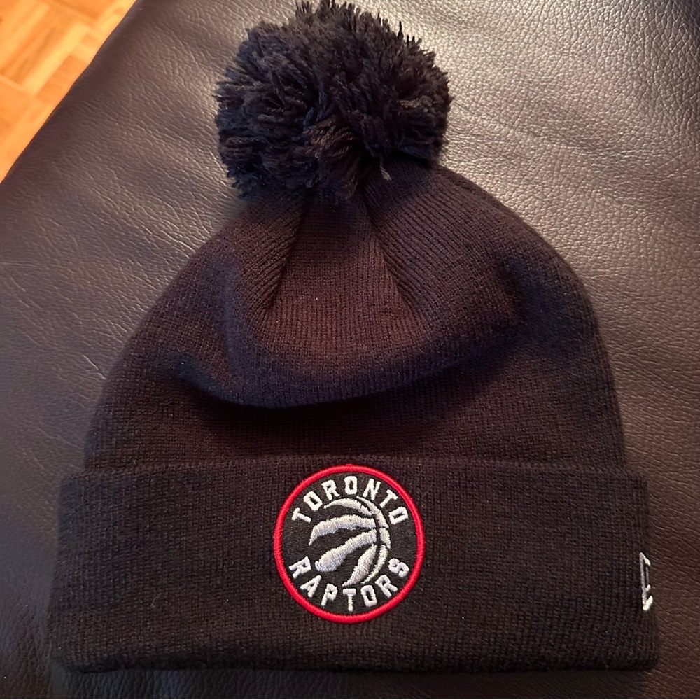 New Era Toronto Raptors black pom pom beanie hat